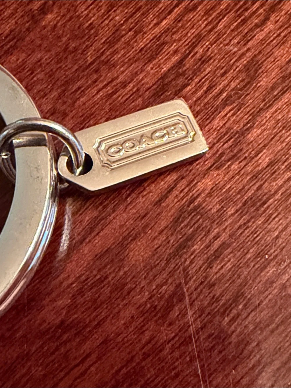 Coach Silver-Tone Key Ring with Pink Rhinestones